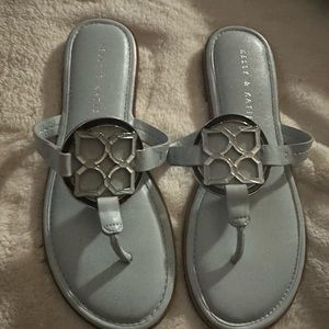 Size 8 1/2 Baby Blue Sandals with a pendant in the middle
